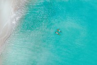 Couple Swimming Sea